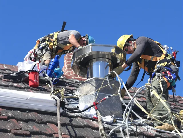 Protective chimney cap installed by Clinton Chimney Sweep in Clinton, MA