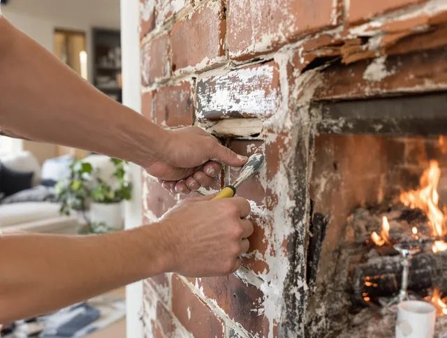 Routine fireplace repair by Clinton Chimney Sweep in Clinton, MA